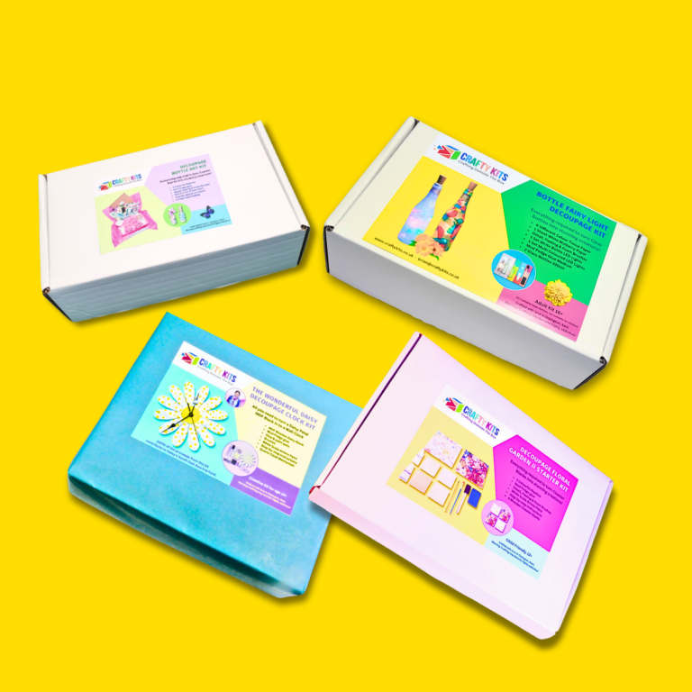 Crafty Kits Four brightly coloured gift boxes with playful designs on vibrant yellow background.